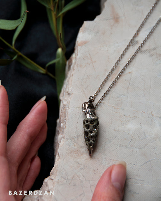 Necklace Figure by Benjamin Kavazović