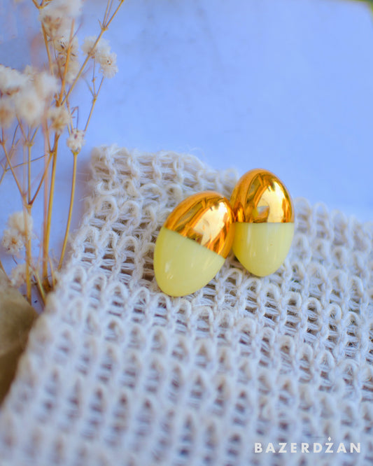 Yellow porcelain drop earrings by Studio Tekne