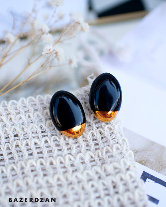 Black porcelain drop earrings by Studio Tekne